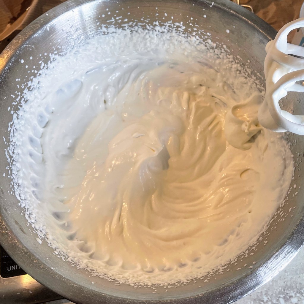 The yogurt and coconut mixture after whisking - the mixture is light and just about holds its shape when the whisk is removed.